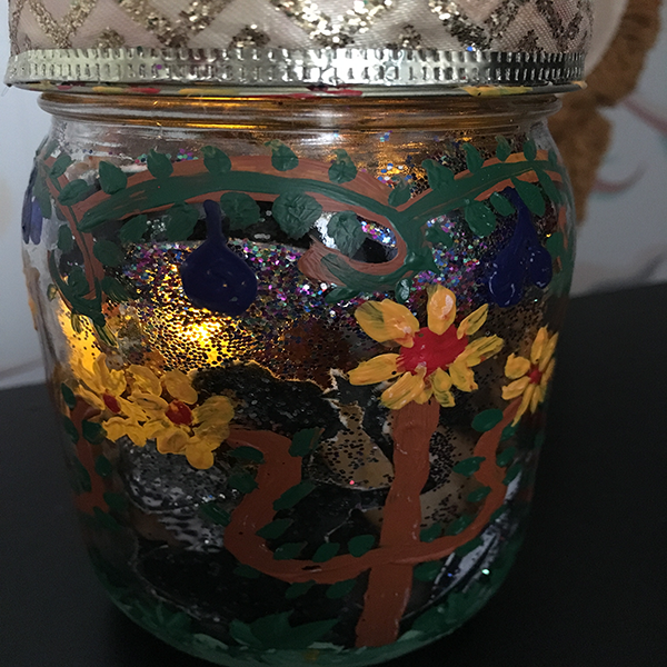 A candle jar - decorated