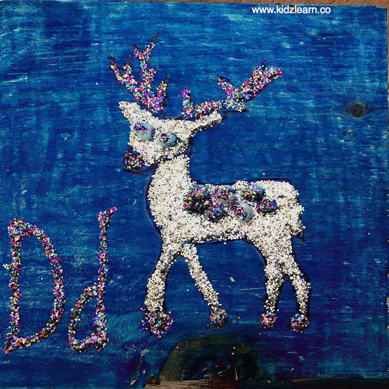 Deer art on a wooden slab